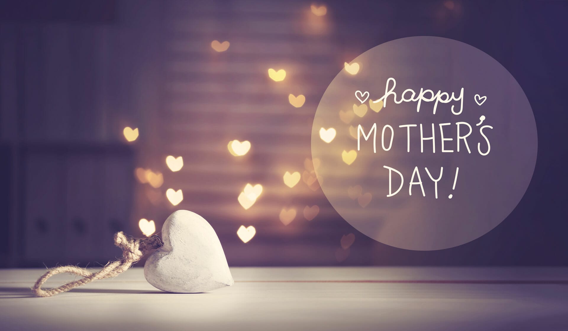 Happy Mothers Day on purple background